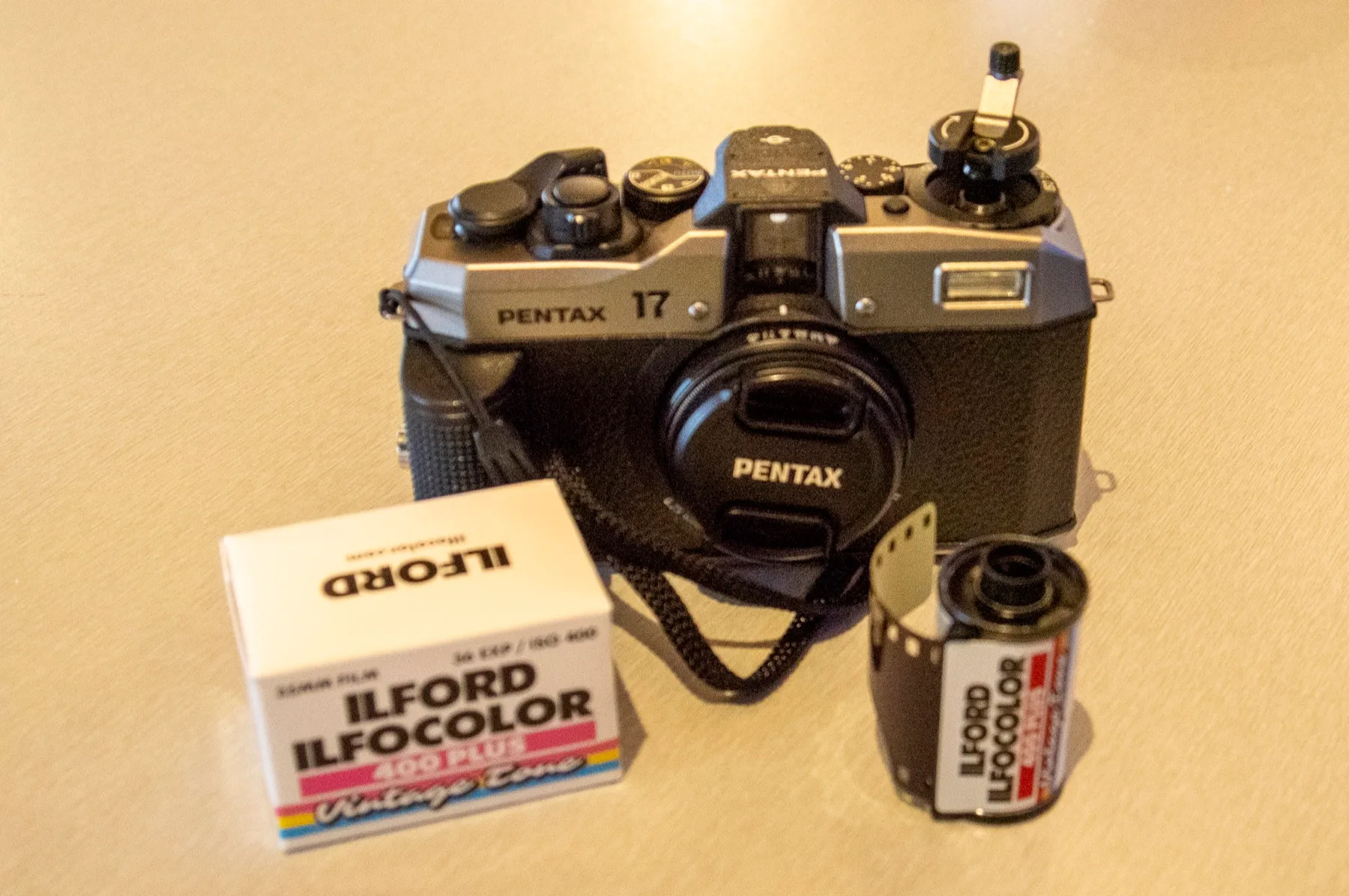 Pentax 17 camera, top-and-back view showing controls