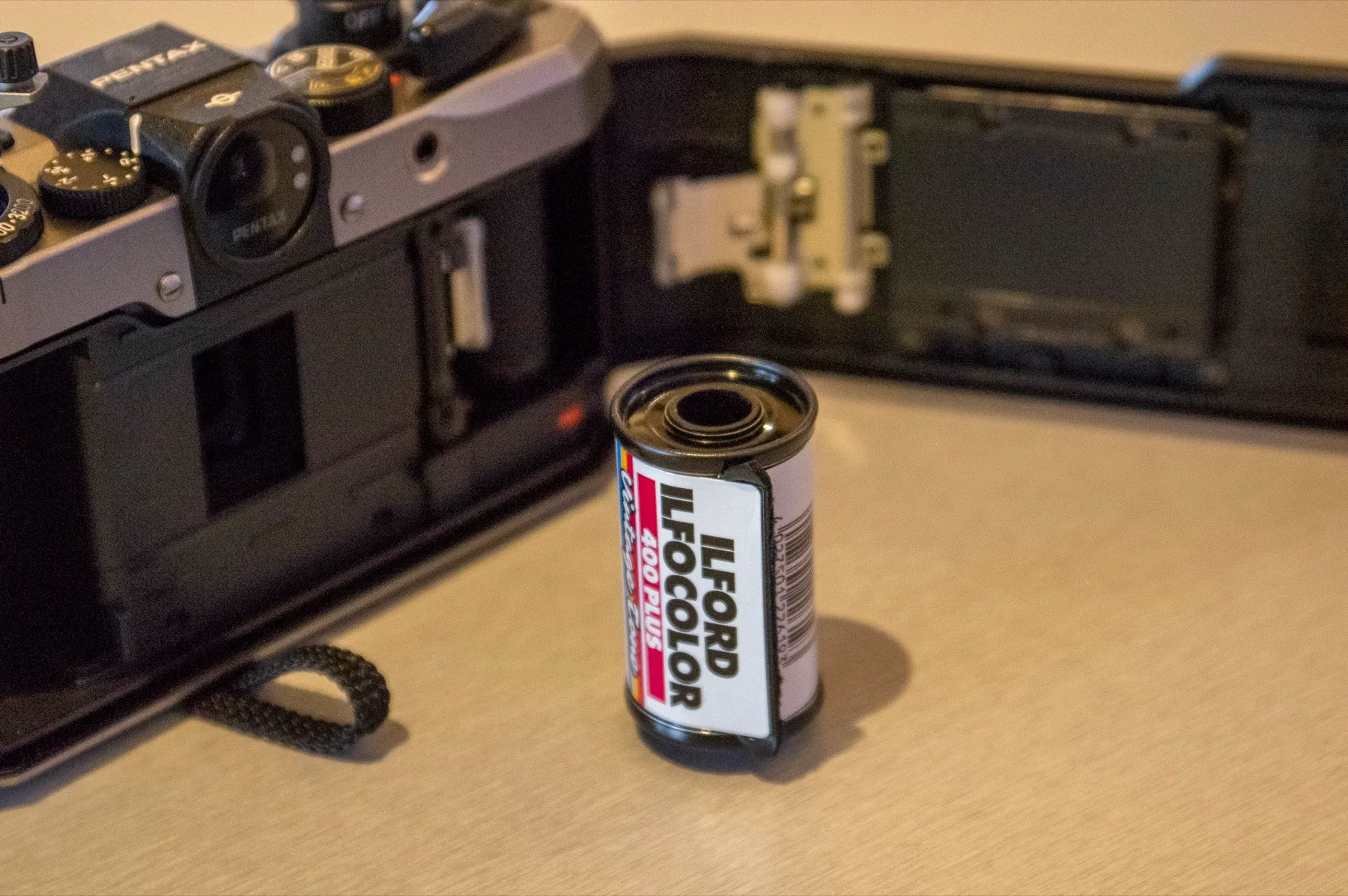 Pentax 17 half-frame film camera, front three-quarter view